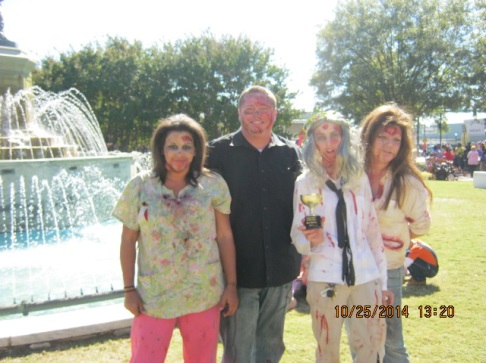 people standing in front of a fountain